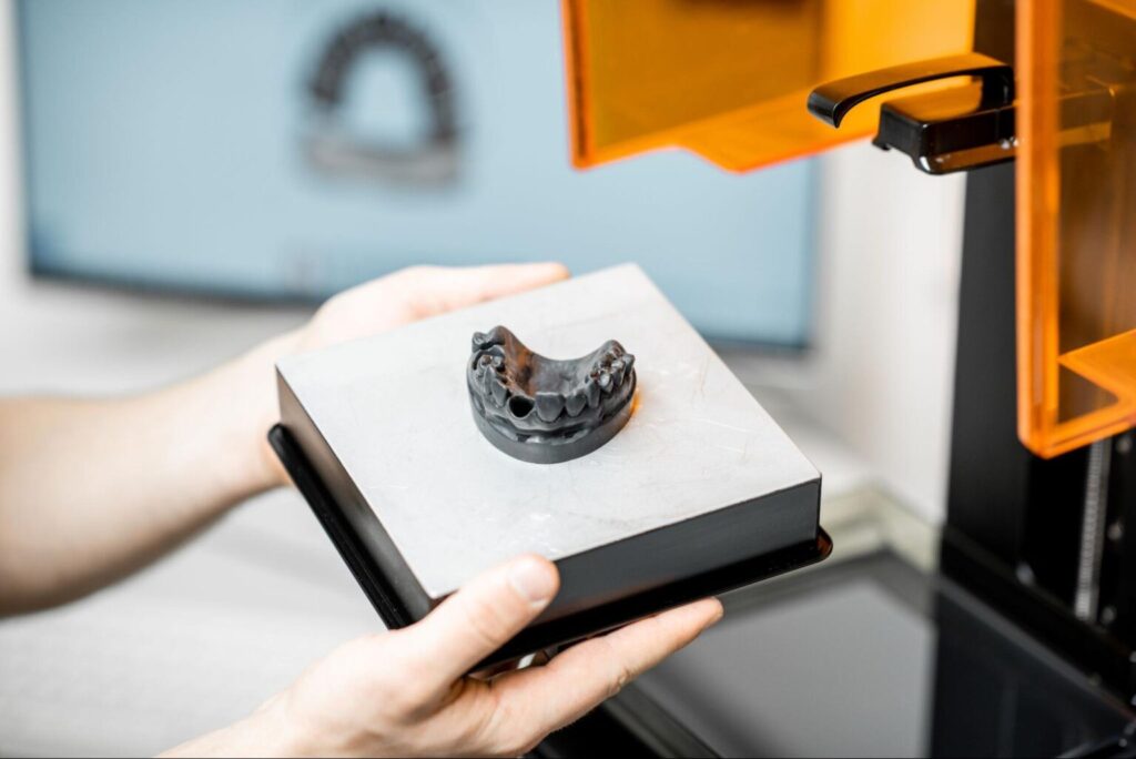 Technicians crafting custom orthodontic appliances in the Specialty Appliances laboratory